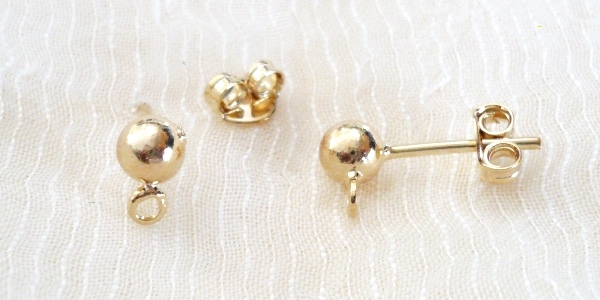 GFA-07404C_1 Goldfilled Oro Laminado 14k Arete Broquel. 4mm. 1 par.